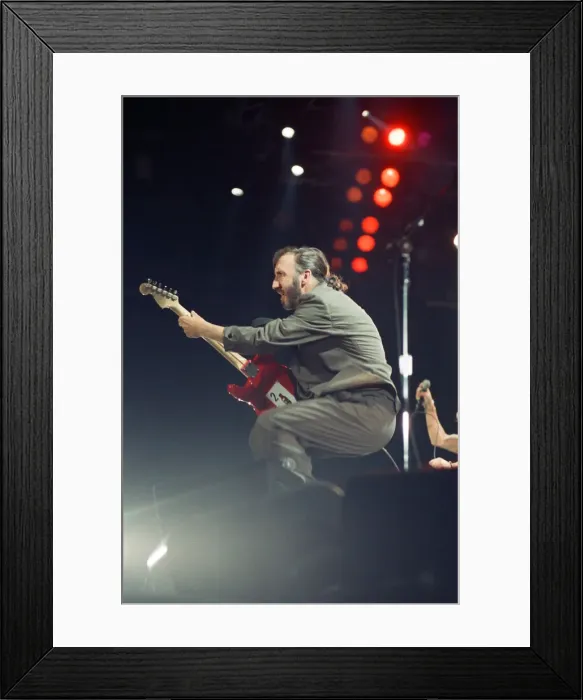 Framed Print : British rock group The Who performing on stage at the Birmingham NEC Arena during