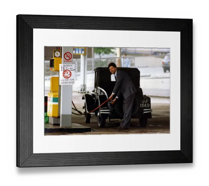 Framed Print : World War Two - Second World War - Martin Davison of Bristol Street Motors garage serves