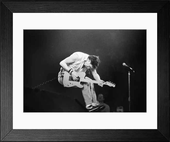 Framed Print : British rock group The Who in Toronto, Canada. Guitarist Pete Townshend performing Framed Print : British rock group The Who in Toronto, Canada. Guitarist Pete Townshend performing