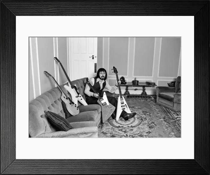 Framed Print : Bass guitarist of The Who rock group John Entwistle pictured at his home in Ealing