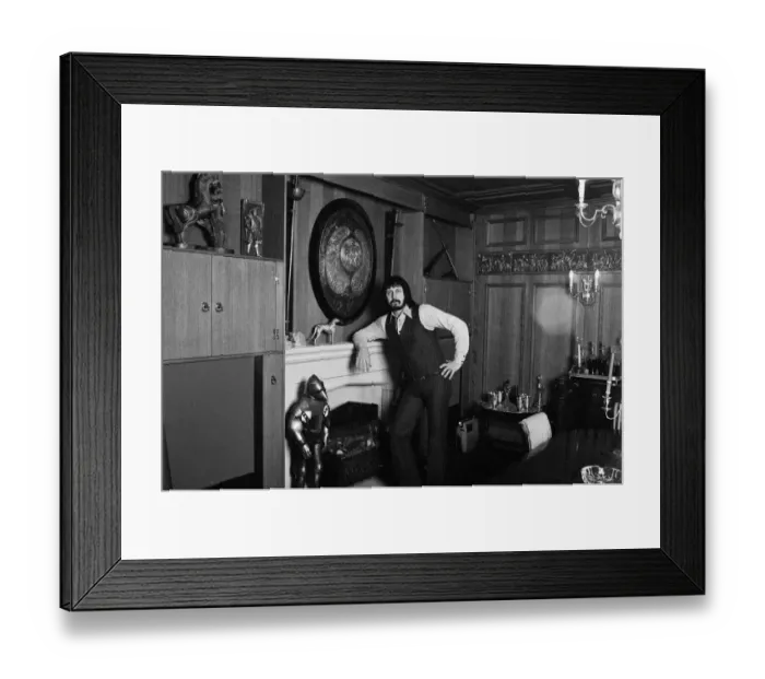 Framed Print : Bass guitarist of The Who rock group John Entwistle pictured at his home in Ealing
