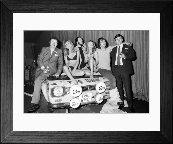 Framed Print : Members of The Who rock group Keith Moon and Pete Townshend show off the £ Framed Print : Members of The Who rock group Keith Moon and Pete Townshend show off the £