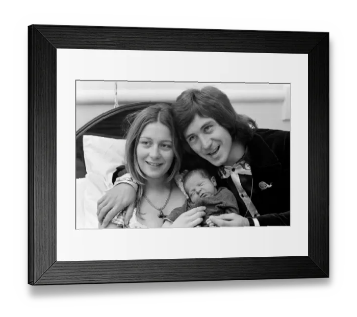 Framed Print : Drummer Kenney Jones of the Faces pop group with his wife Jan at the Welbeck Street