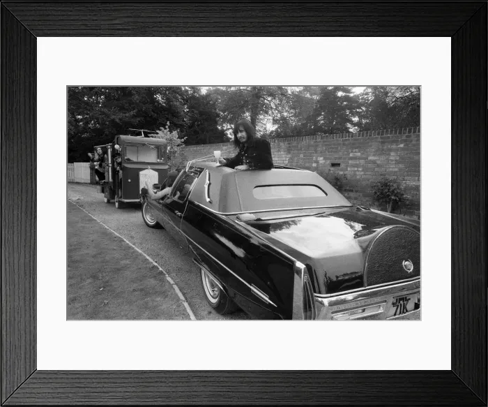 Framed Print : John Entwistle and Keith Moon of the rock group The Who show off their new cars Framed Print : John Entwistle and Keith Moon of the rock group The Who show off their new cars