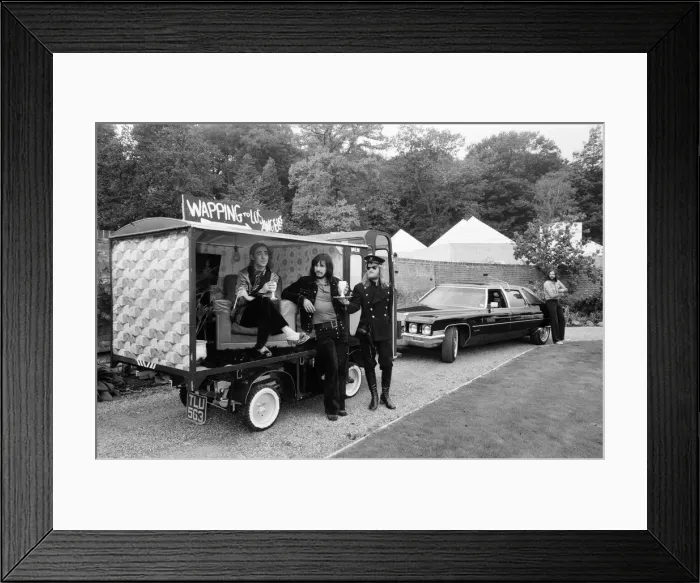 Framed Print : John Entwistle and Keith Moon of the rock group The Who show off their new cars Framed Print : John Entwistle and Keith Moon of the rock group The Who show off their new cars