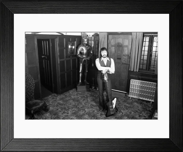 Framed Print : Bass guitarist of The Who rock group John Entwistle pictured at his home in Ealing