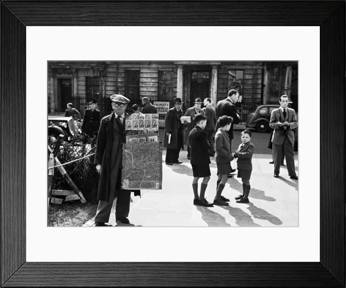 Framed Print : Londoners file pass the Sir William Reid Dicks statue of FDR shortly after it was Framed Print : Londoners file pass the Sir William Reid Dicks statue of FDR shortly after it was