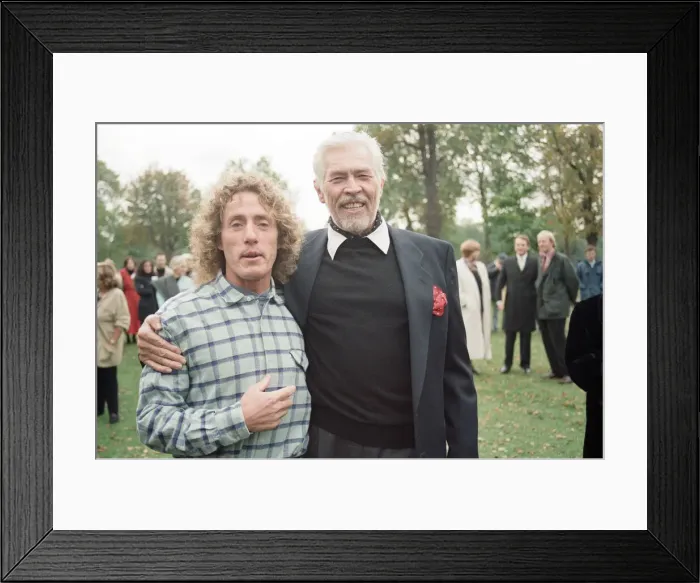 Framed Print : Roger Daltrey, singer of British rock group The Who, pictured with actor James Coburn Framed Print : Roger Daltrey, singer of British rock group The Who, pictured with actor James Coburn