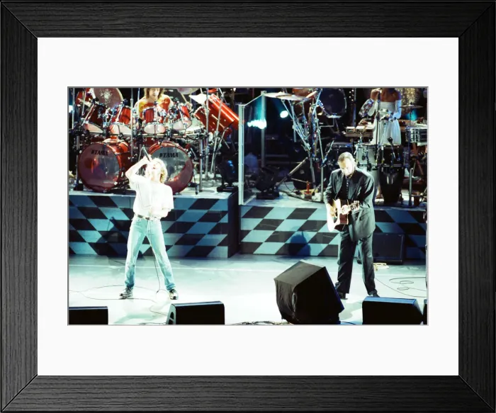 Framed Print : The Who rock group performing on stage in America during their reunion tour in Framed Print : The Who rock group performing on stage in America during their reunion tour in