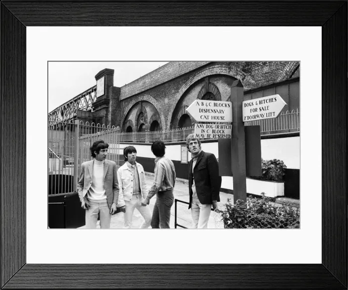 Framed Print : Members of The Who rock group sent their managers to purchase a guard dog at Battersea