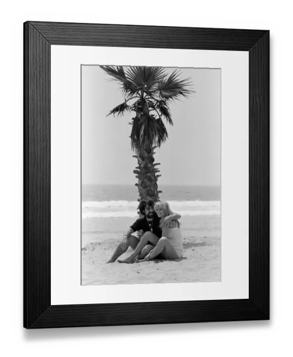 Framed Print : Keith Moon, drummer of The Who rock group with model Annette Lax in the resort of Malibu Framed Print : Keith Moon, drummer of The Who rock group with model Annette Lax in the resort of Malibu