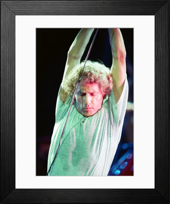 Framed Print : The Who rock group performing on stage in America during their reunion tour in Framed Print : The Who rock group performing on stage in America during their reunion tour in