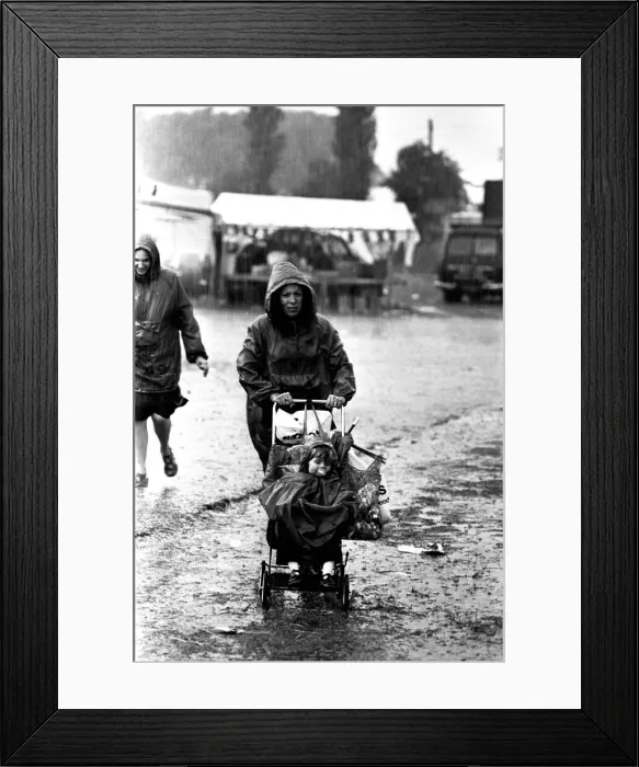 Framed Print : Severe stormy weather with torrential rain and flooding at the annual Summer Exhibition Framed Print : Severe stormy weather with torrential rain and flooding at the annual Summer Exhibition