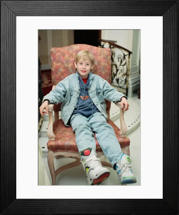 Framed Print : Macaulay Culkin sips his tea as he toasts his membership of he million-dollar-a movie Framed Print : Macaulay Culkin sips his tea as he toasts his membership of he million-dollar-a movie
