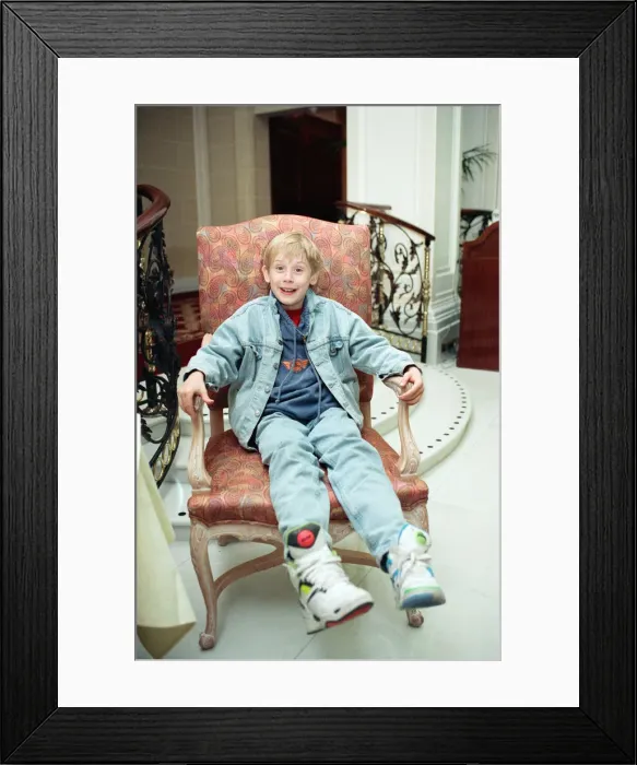 Framed Print : Macaulay Culkin sips his tea as he toasts his membership of he million-dollar-a movie Framed Print : Macaulay Culkin sips his tea as he toasts his membership of he million-dollar-a movie