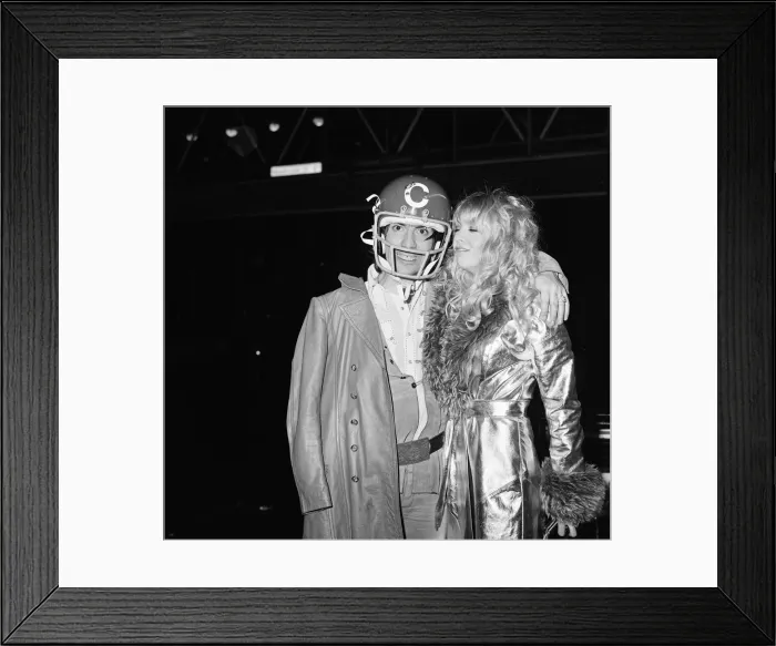 Framed Print : Keith Moon, drummer of The Who rock group, arrives in London wearing an American crash Framed Print : Keith Moon, drummer of The Who rock group, arrives in London wearing an American crash