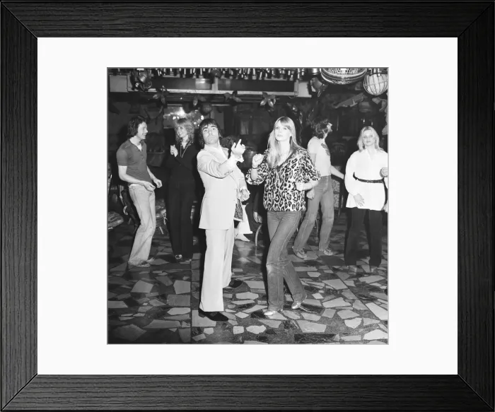 Framed Print : Keith Moon, drummer of The Who rock group, pictured with his girlfriend Annette dancing Framed Print : Keith Moon, drummer of The Who rock group, pictured with his girlfriend Annette dancing