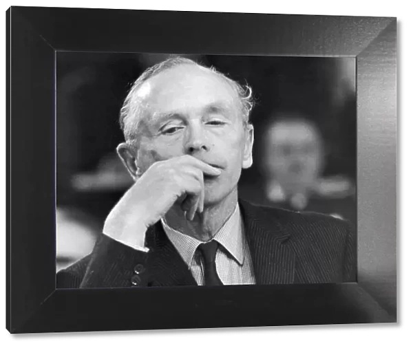 Conservative Party Leader Sir Alec Douglas Home looks on pensively during