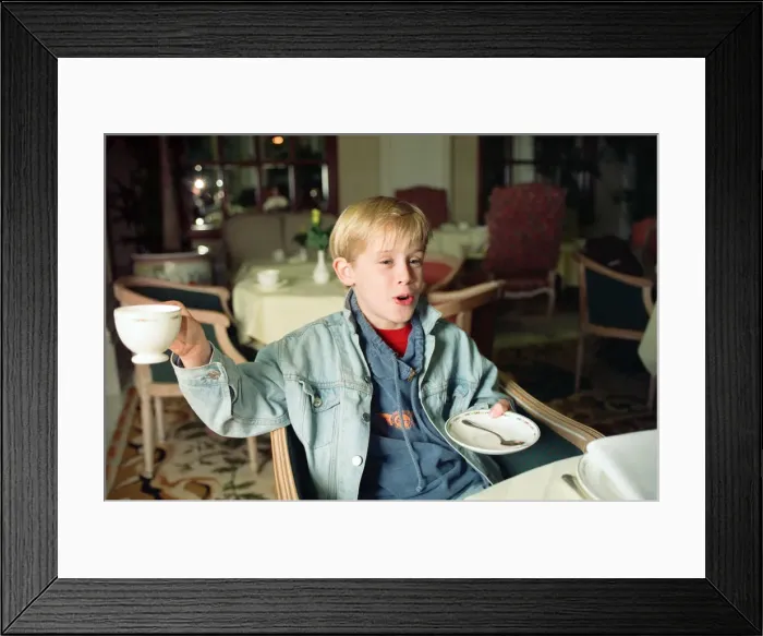 Framed Print : Macaulay Culkin sips his tea as he toasts his membership of he million-dollar-a movie Framed Print : Macaulay Culkin sips his tea as he toasts his membership of he million-dollar-a movie