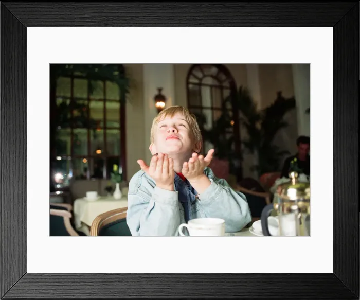 Framed Print : Macaulay Culkin sips his tea as he toasts his membership of he million-dollar-a movie Framed Print : Macaulay Culkin sips his tea as he toasts his membership of he million-dollar-a movie