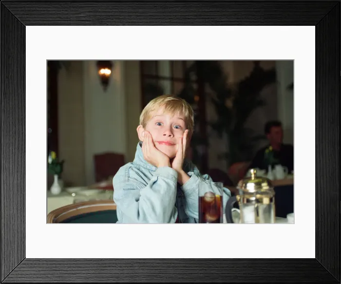 Framed Print : Macaulay Culkin sips his tea as he toasts his membership of he million-dollar-a movie Framed Print : Macaulay Culkin sips his tea as he toasts his membership of he million-dollar-a movie