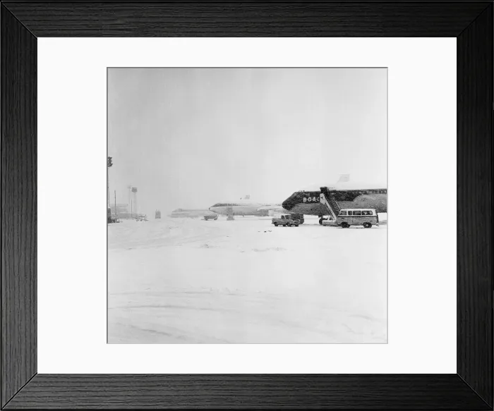 Framed Print : De-icing operations were in progress when a mobile spryer was used on the tail