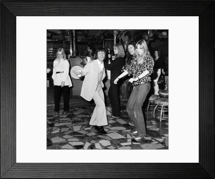 Framed Print : Keith Moon, drummer of The Who rock group, pictured with his girlfriend Annette dancing Framed Print : Keith Moon, drummer of The Who rock group, pictured with his girlfriend Annette dancing