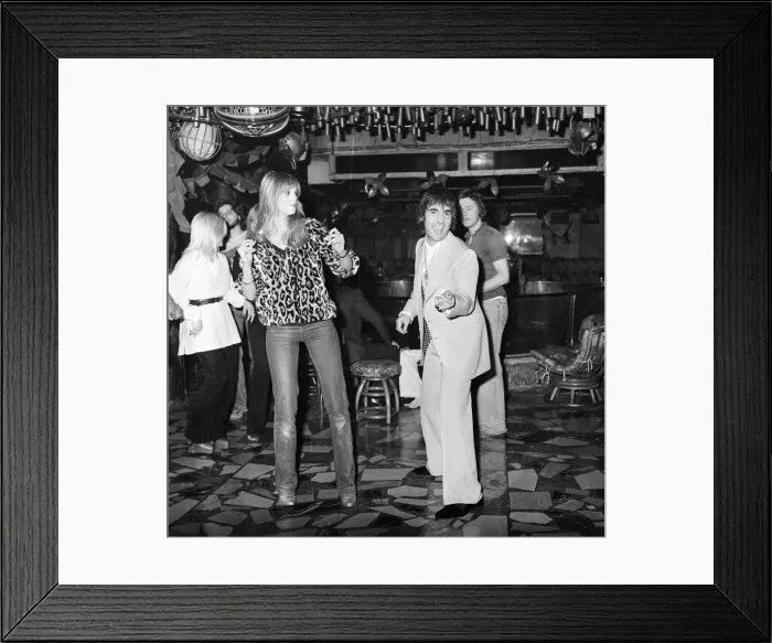 Framed Print : Keith Moon, drummer of The Who rock group, pictured with his girlfriend Annette dancing Framed Print : Keith Moon, drummer of The Who rock group, pictured with his girlfriend Annette dancing