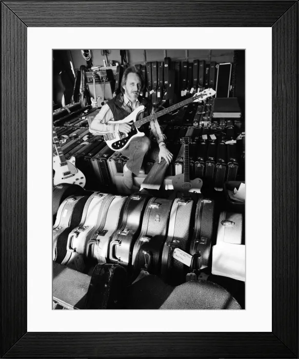 Framed Print : John Entwistle, bass guitarist of The Who rock group, pictured at his home Framed Print : John Entwistle, bass guitarist of The Who rock group, pictured at his home