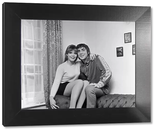 Keith Moon, drummer of British rock group The Who, pictured with his wife Kim at their