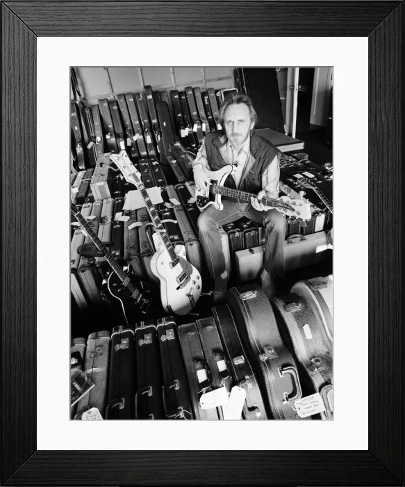 Framed Print : John Entwistle, bass guitarist of The Who rock group, pictured at his home Framed Print : John Entwistle, bass guitarist of The Who rock group, pictured at his home