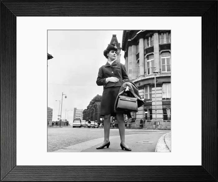 Framed Print : Woman modelling new BEA air stewardess uniform. 1st April 1968 Framed Print : Woman modelling new BEA air stewardess uniform. 1st April 1968