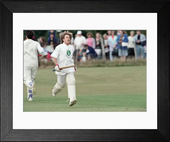 Framed Print : Roger Daltrey, lead singer of The Who rock group, in action during a charity cricket Framed Print : Roger Daltrey, lead singer of The Who rock group, in action during a charity cricket