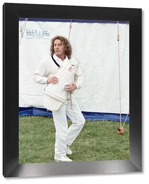Roger Daltrey, lead singer of The Who rock group, in action during a charity cricket
