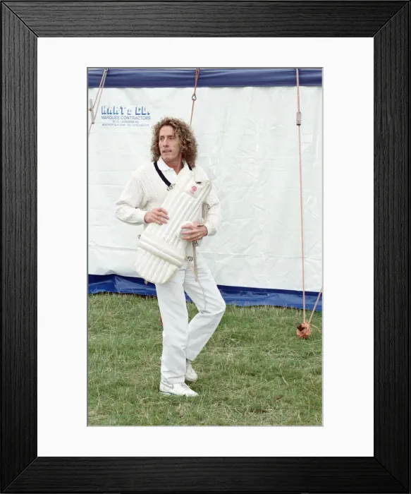 Framed Print : Roger Daltrey, lead singer of The Who rock group, in action during a charity cricket Framed Print : Roger Daltrey, lead singer of The Who rock group, in action during a charity cricket