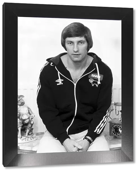 Colin Todd Derby and England footballer, poses wearing his clubs track top