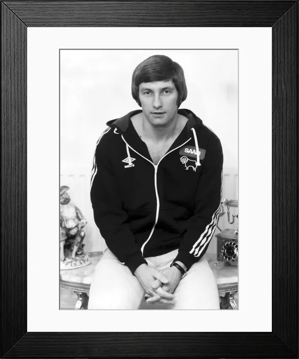 Framed Print : Colin Todd Derby and England footballer, poses wearing his clubs track top Framed Print : Colin Todd Derby and England footballer, poses wearing his clubs track top