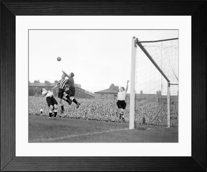 Framed Print : Division One Newcastle United v Derby County. Derby County goal keeper punches away a Framed Print : Division One Newcastle United v Derby County. Derby County goal keeper punches away a