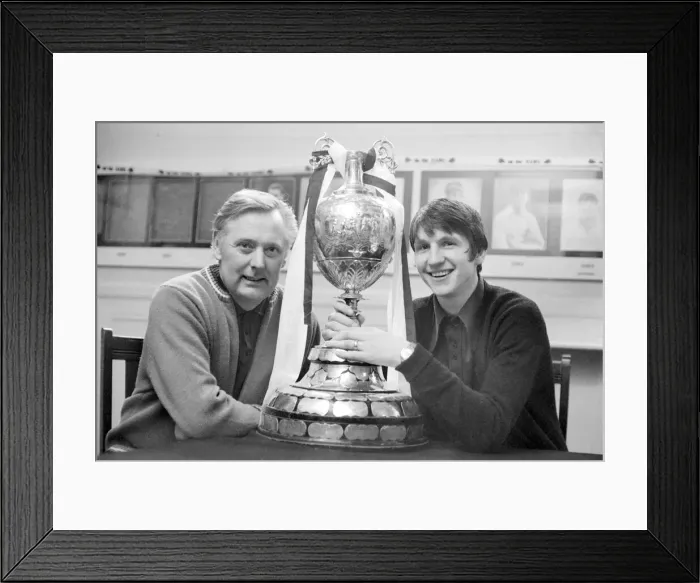 Framed Print : Assistant manager Peter Taylor and striker Roger Davis pose with the League Championship Framed Print : Assistant manager Peter Taylor and striker Roger Davis pose with the League Championship