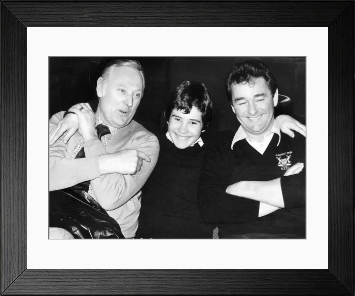 Framed Print : Fourteen year old Nigel Clough hugging his father Nottingham Forest manager Brian Clough