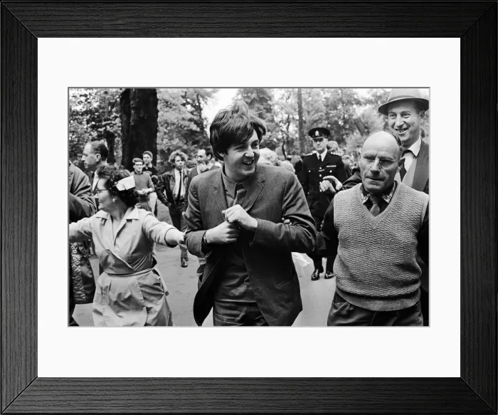 Framed Print : Paul McCartney of The Beatles is escorted past waiting fans as he arrives at ABC Studios Framed Print : Paul McCartney of The Beatles is escorted past waiting fans as he arrives at ABC Studios