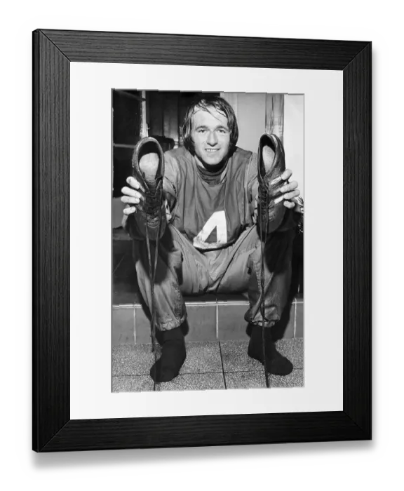 Framed Print : Derby County and Scotland international football player Archie Gemmill with boots Framed Print : Derby County and Scotland international football player Archie Gemmill with boots