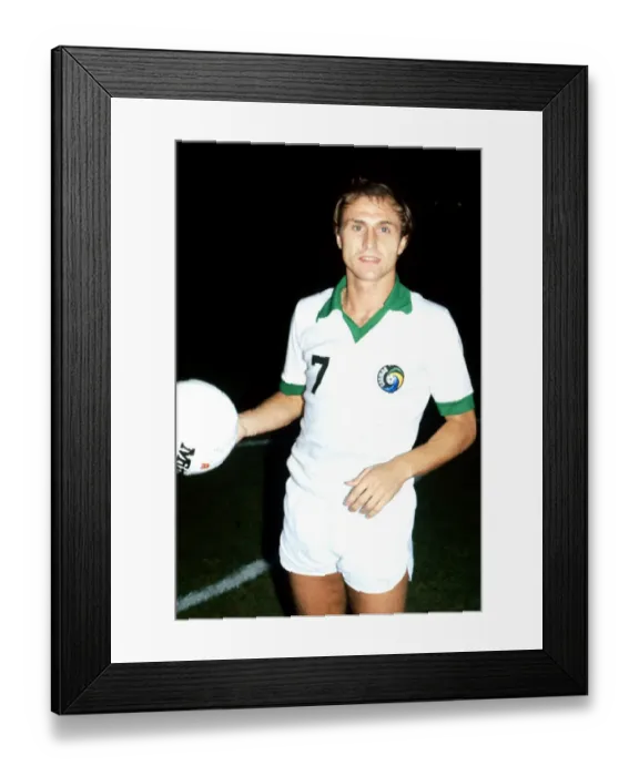 Framed Print : New York Cosmos Dennis Tueart holding a football October 1978 Framed Print : New York Cosmos Dennis Tueart holding a football October 1978