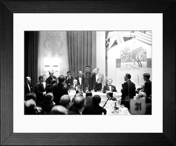 Framed Print : Cassius Clay (Muhammad Ali) laughing into microphone, in London England ahead of his next Framed Print : Cassius Clay (Muhammad Ali) laughing into microphone, in London England ahead of his next