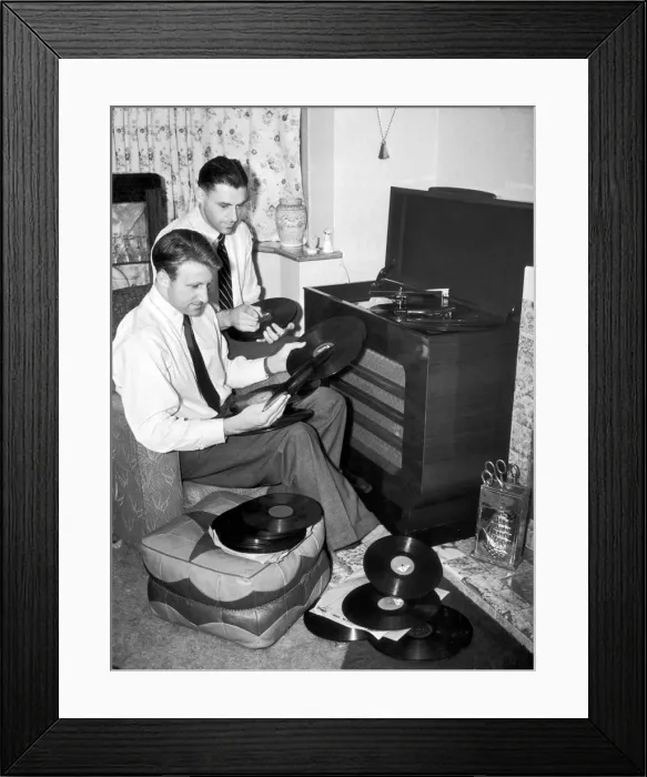 Framed Print : West Bromwich Albion footballer Ray Barlow at home playing records Framed Print : West Bromwich Albion footballer Ray Barlow at home playing records