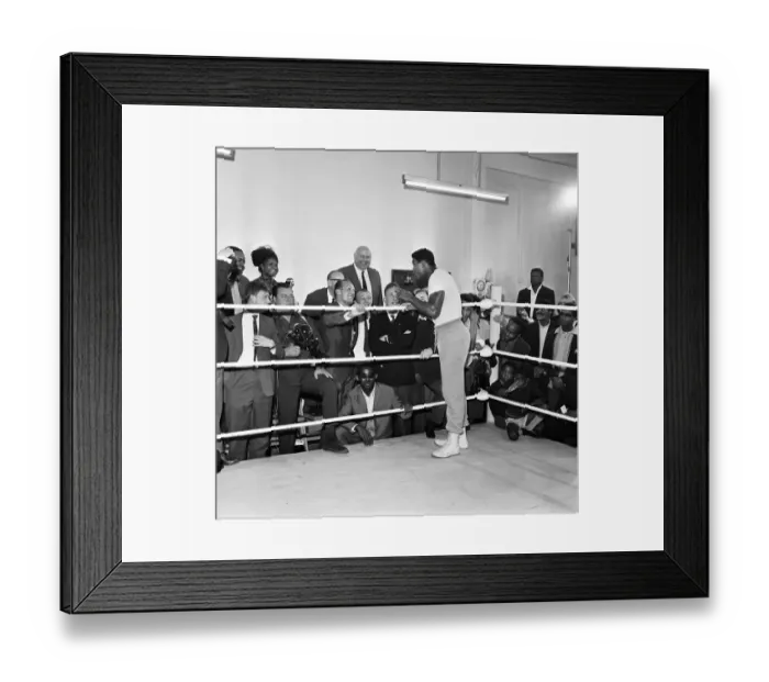 Framed Print : Cassius Clay later to become Muhammad Ali takes time out from training to share a few Framed Print : Cassius Clay later to become Muhammad Ali takes time out from training to share a few