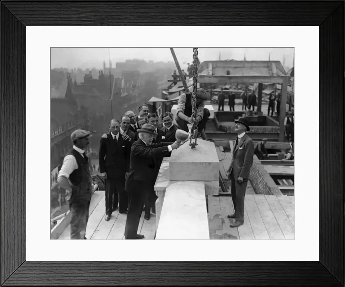 Framed Print : Mr Gordon Selfridge lays the last stone which completes the Oxford Street facade of his Framed Print : Mr Gordon Selfridge lays the last stone which completes the Oxford Street facade of his