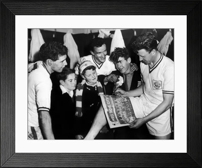 Framed Print : the South Wales Echo promotion souvenir edition in the dressing room at Ninian Park after Framed Print : the South Wales Echo promotion souvenir edition in the dressing room at Ninian Park after