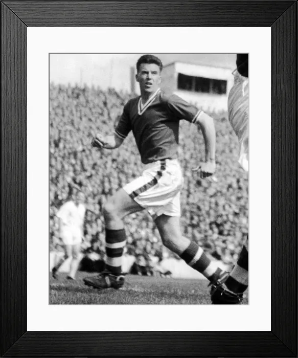 Framed Print : Cardiff City centre half Danny Malloy in action, 27th August 1957