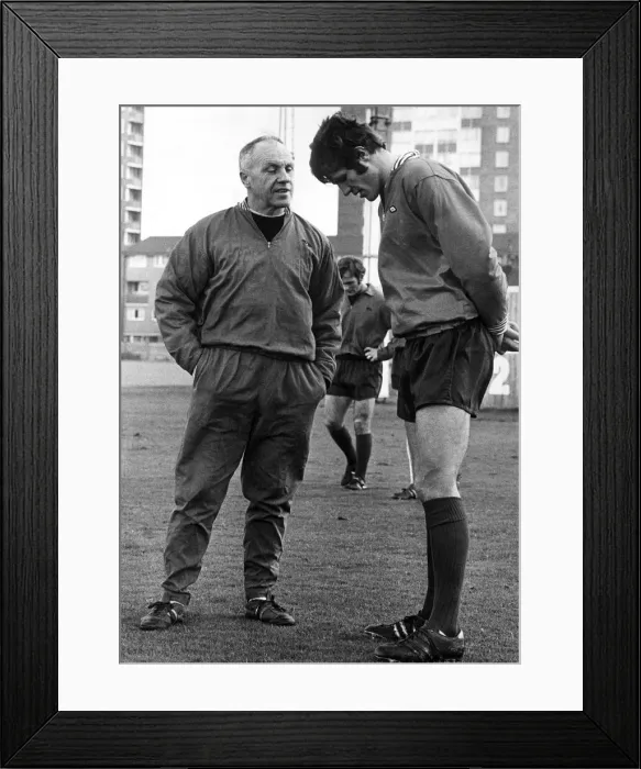 Framed Print : Liverpool manager Bill Shankly talking with John Toshack during a team training session Framed Print : Liverpool manager Bill Shankly talking with John Toshack during a team training session